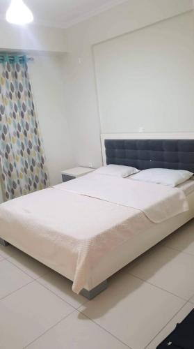 เตียงในห้องที่ Apartment Mariola
