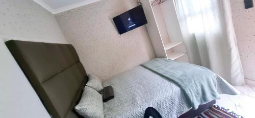 Postel nebo postele na pokoji v ubytování Talitha's Self Catering