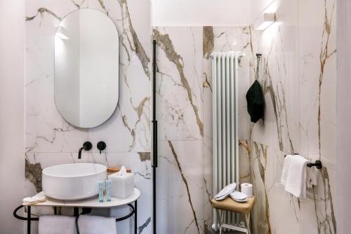 Et badeværelse på Palazzo Vescovile Hotel