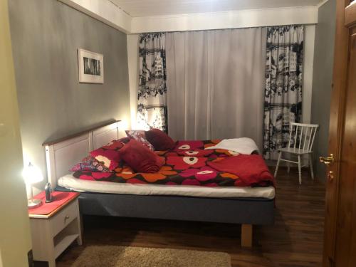 Llit o llits en una habitació de Arctic Circle Apartment