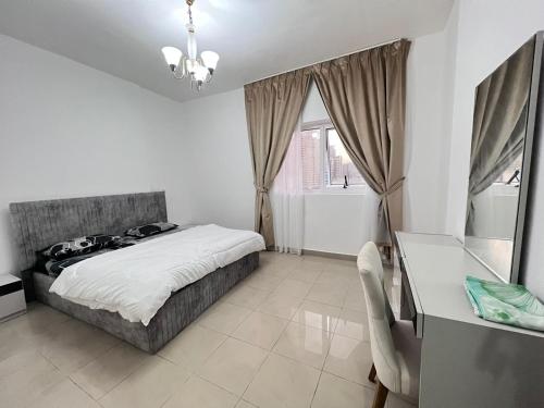 Postelja oz. postelje v sobi nastanitve Malik property
