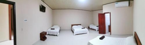 En eller flere senge i et værelse på El Paso de Almirante