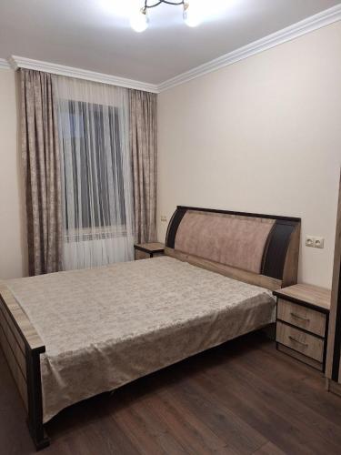Postel nebo postele na pokoji v ubytování Dili House