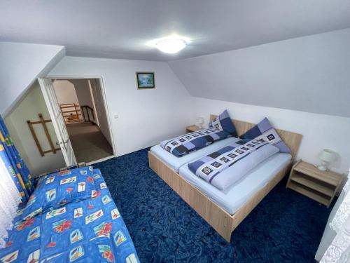 En eller flere senge i et værelse på Casa Stana