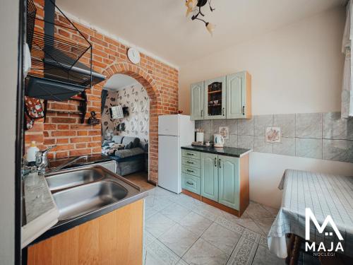 Nhà bếp/bếp nhỏ tại Noclegi MAJA