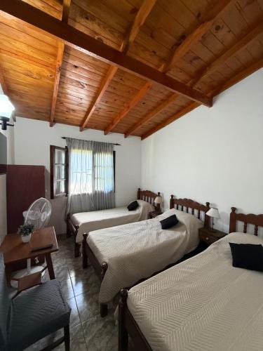 En eller flere senge i et værelse på Casa Mar de Cobo