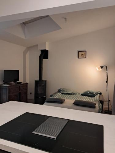 En eller flere senge i et værelse på l'annexe