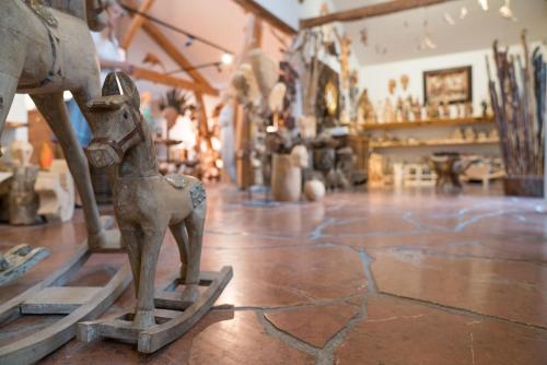a metal figurine of a horse in a room at Atelier Garni Astei in Grossarl