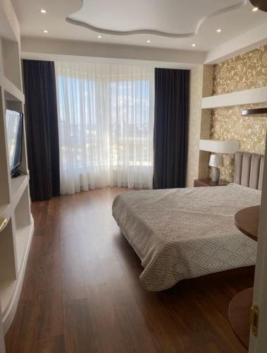 Lova arba lovos apgyvendinimo įstaigoje Apartament modern
