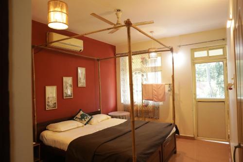 En eller flere senge i et værelse på Charlotte Homes by Nosso Amor