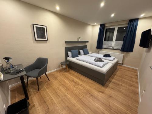 En eller flere senge i et værelse på The Pharmacy Inn