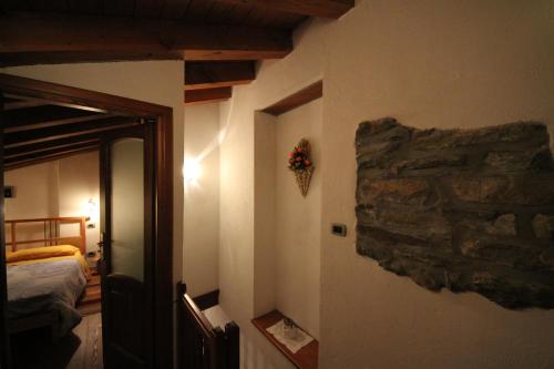 B&B Vecchio Torchio di Bardにあるベッド