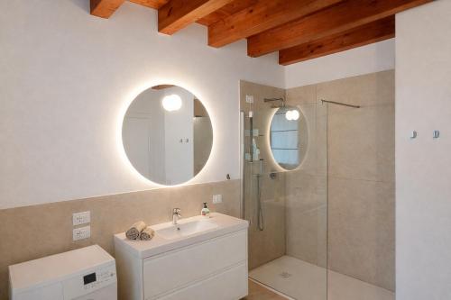 a bathroom with a sink and a shower at Agriturismo Casa Bregalda in Castelgomberto