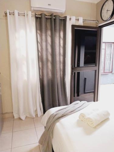 Llit o llits en una habitació de Nakanyala B&B