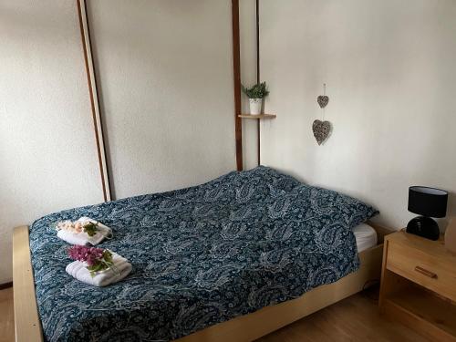 Giường trong phòng chung tại Huisje Buurserbeek