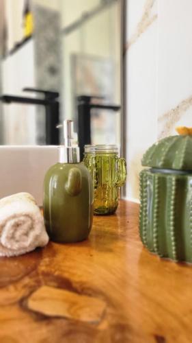 a kitchen counter with a green pepper on a table at Personal blue house Madeira in Santa Cruz