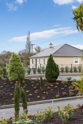 a house with a garden in front of it at Church View Country House