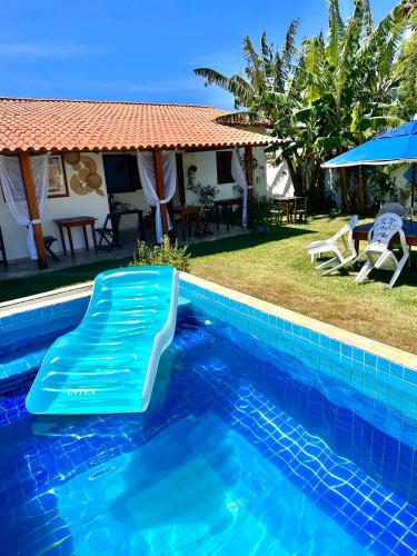 Swimmingpoolen hos eller tæt på Pousada Grão de Areia