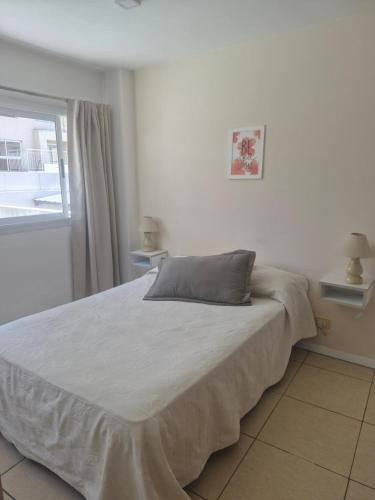 En eller flere senge i et værelse på PASAJE EN EL CENTRO DE LOMAS