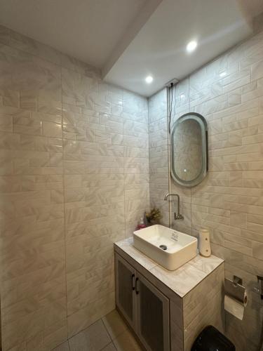 a bathroom with a sink and a mirror at Casa Rubio private Resort in Los Baños