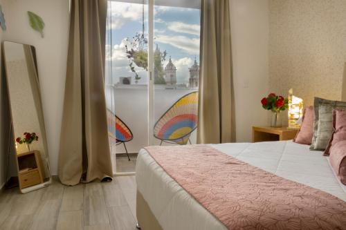 En eller flere senge i et værelse på Santuario De Luna, Departamento