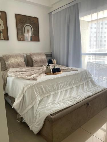 En eller flere senge i et værelse på LoftPrime Experience Piscina Sauna & Wi-Fi Ultra Rápido