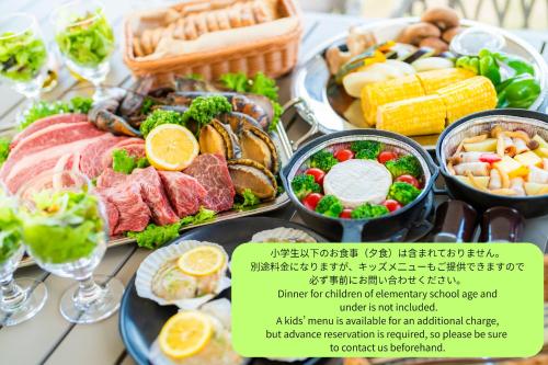 a table full of food with different types of food at LIT shimanami リットシマナミ in Onomichi