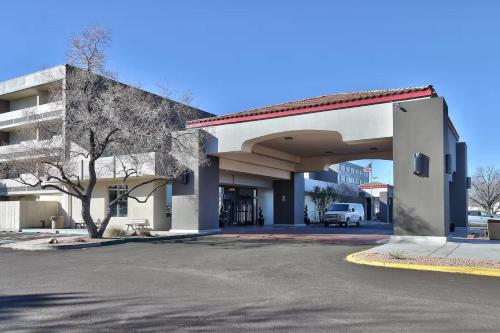 a gas station with a car parked in the garage at Hotel Kiva, an Ascend Collection Hotel in Albuquerque