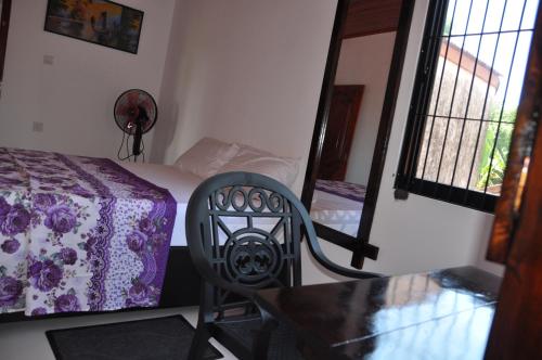 Cama o camas de una habitación en The Beau Beach Weligama