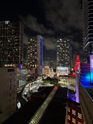 a view of a city at night with buildings at Miami Luxury Suite Infinity Pool in Miami