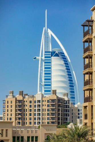 a view of the burj khalifa and the city at Asayel Apartments in Dubai