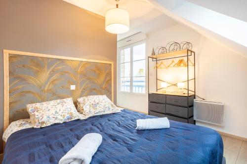 En eller flere senge i et værelse på L'Eclose - Les Korrigans