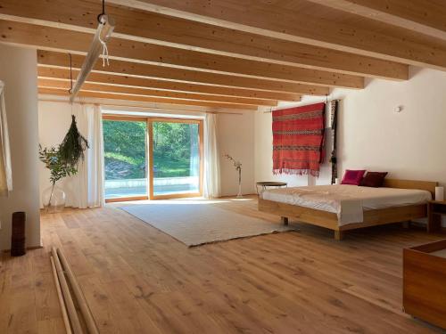 Een bed of bedden in een kamer bij Alte Mühle Kaisersdorf