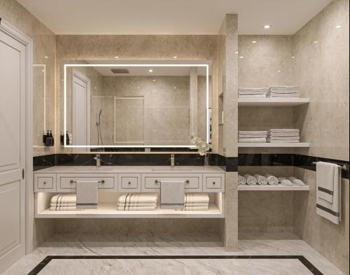 a bathroom with a large mirror and a sink at The Grand Resort Rarotonga - Adults Only in Rarotonga