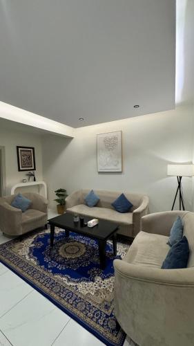 Et opholdsområde på شقة سويس بدخول ذاتي