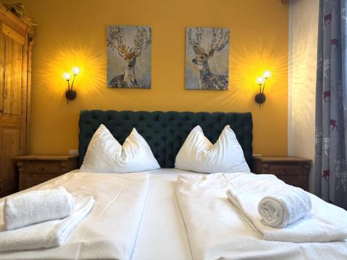 Postel nebo postele na pokoji v ubytování Apartment M - Zell am See