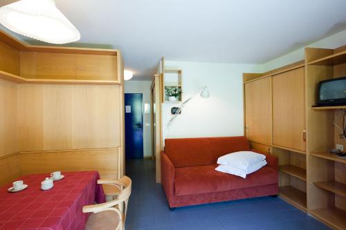 Postel nebo postele na pokoji v ubytování Residence Campolongo