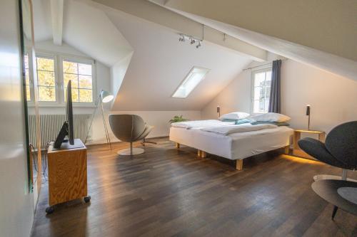 Ένα ή περισσότερα κρεβάτια σε δωμάτιο στο EMMA Bett und Bistro