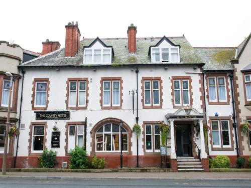 an old building on the corner of a street at The County Hotel by Innkeeper's Collection in Lytham St Annes