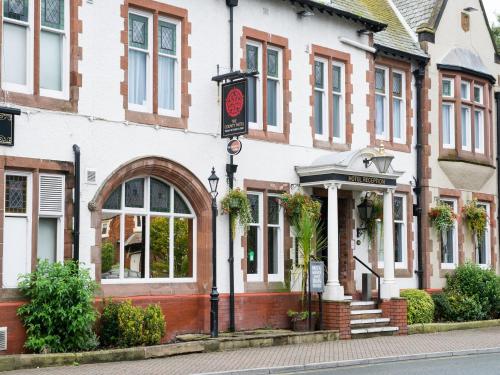a building with a sign on the front of it at The County Hotel by Innkeeper's Collection in Lytham St Annes