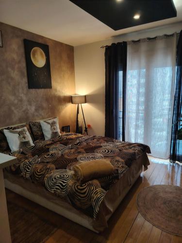 Säng eller sängar i ett rum på BG apartman