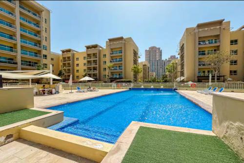 Picture of Vogue Al Alka 1 Greens 1 Bedroom Apartment with Balcony Pool Gym ...