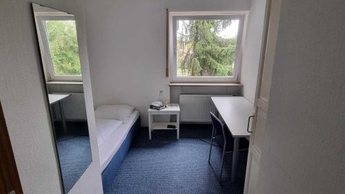 Katil atau katil-katil dalam bilik di Hotel 3H Mannheim