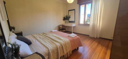 En eller flere senge i et værelse på Villa Due Cieli 1