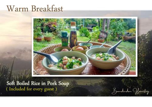 a picture of a bowl of food on a table at Baandindon Private Earthhouse Homestay in Mae Rim