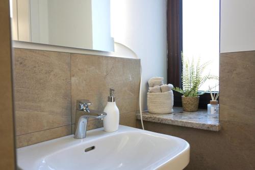 Koupelna v ubytování GreenTreeHomes - Stadtvilla Linde