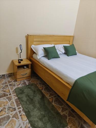 Llit o llits en una habitació de TATAICHA Appart