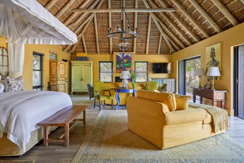 Giường trong phòng chung tại Royal Malewane