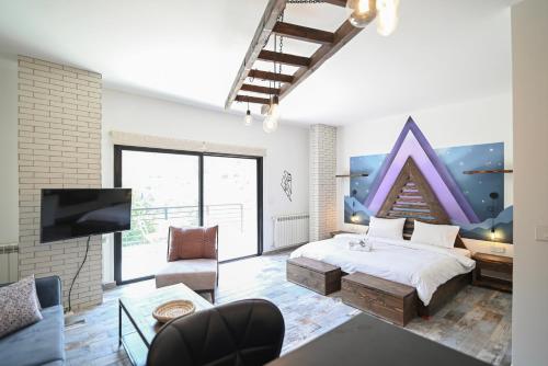 Giường trong phòng chung tại Arawan - Boutique Art Hotel - Tannourine