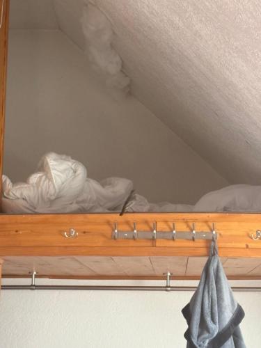 En eller flere senge i et værelse på Sky Harmony Penthouse mit Wasserbett, Jacuzzi und Grill